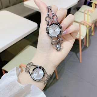 Đồng hồ nữ lắc tay mặt tròn, thiết kế mắt GU 3 màu trắng - vàng - vàng đen Gossie Lắc GU
