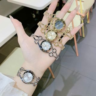 Đồng hồ nữ lắc tay mặt tròn, thiết kế mắt GU 3 màu trắng - vàng - vàng đen Gossie Lắc GU