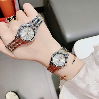 Đồng hồ nữ mặt tròn cọc đá, dây kim loại 2 màu xanh - bạc Gossie Kim Cương