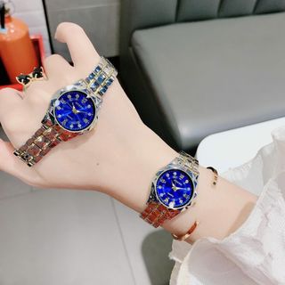Đồng hồ nữ mặt tròn cọc đá, dây kim loại 2 màu xanh - bạc Gossie Kim Cương