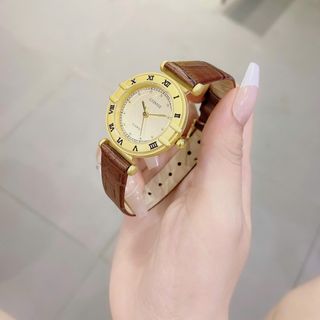 Đồng hồ nữ mặt tròn số La Mã, dây da nâu cổ điển Gossie Nâu La Mã