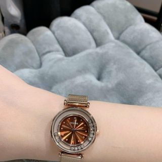 Đồng hồ nữ dây mành, viền đá xoay sang trọng Gossie Mành Viền Đá Xoay