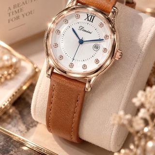 Đồng hồ nữ mặt tròn đính đá, dây da nâu có lịch sang trọng Dimini Cao Cấp