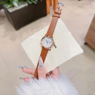 Đồng hồ nữ mặt tròn đính đá, dây da nâu có lịch sang trọng Dimini Cao Cấp