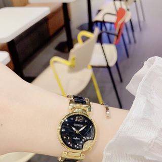 Đồng hồ nữ mặt đen đính đá, dây kim loại phối đen Gossie Đá Công Đen