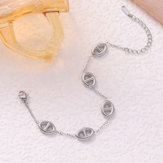 Vòng tay nữ thép titan mắt oval tone bạc thanh lịch Vòng Tay Thép Titan Mũi Heo