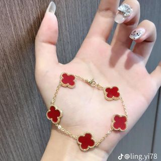 Vòng tay nữ cỏ bốn lá đỏ viền vàng sang trọng