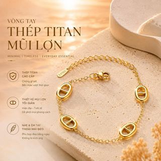 Vòng tay nữ thép titan mắt oval tone vàng sang trọng Vòng Tay Thép Titan Mũi Lợn