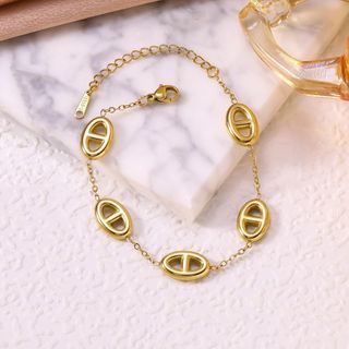Set đồng hồ nữ BS Mác phối vòng tay mũi heo tone vàng sang trọng Set BS Mác Mũi Heo Vàng