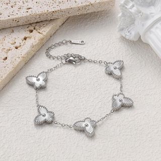 Set đồng hồ nữ phối vòng tay bướm titan sang trọng Gossie Hồ Điệp Titan Bướm Năm Cánh