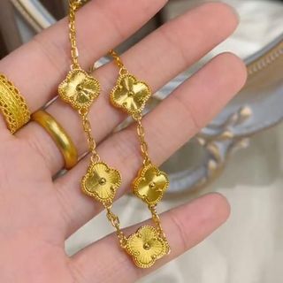 Lắc tay nữ cỏ lá vàng họa tiết kim tiền sang trọng Lắc Tay Kim Tiền Cỏ Lá Vàng