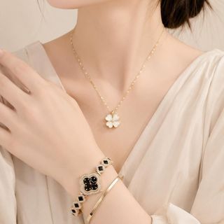 Set đồng hồ nữ Gossie phối dây chuyền, bông tai cỏ bốn lá mắt mèo sang trọng Set Gossie Mắt Mèo Cỏ Bốn Lá
