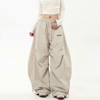 QUẦN DÙ NỮ ỐNG RỘNG XẾP LY