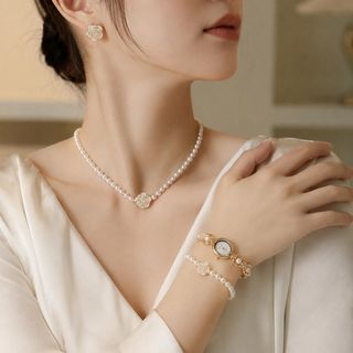 Set đồng hồ nữ phối trang sức ngọc trai hoa trà sang trọng Gossie – Set Ngọc Bảo Ngọc Trai Hoa Trà