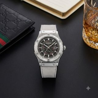 [ LEOTINO x DQN ] - M165 - Đồng hồ Nam thiết kế thể thao thượng lưu mặt Skeleton lộ cơ đính đá Baguette, vỏ thép bạc kết hợp dây da lộn xám cao cấp