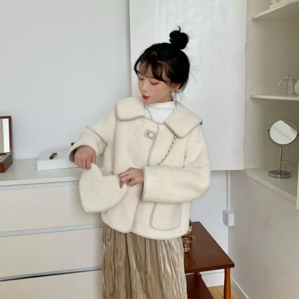 Review áo lông cừu TokyoLife | Giá áo lông cừu là bao nhiêu?